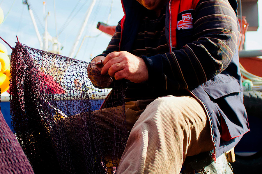 Foto pescador y red de pesca Foto pescador y red de pesca